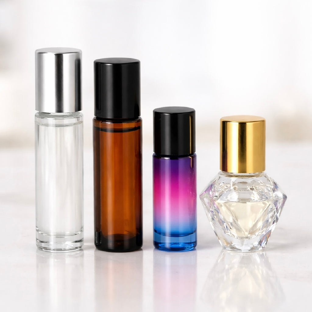 DyJest essential oil roller bottle styles lined up horizontally for comparison in sizes 10ml & 5ml, including clear, amber, gradient, & diamond bottles
